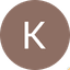 White letter K inside a brown circular user avatar